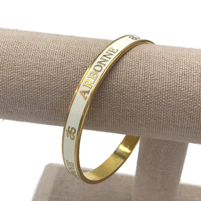 Arbonne Cream Enamel & Gold Tone Logo Bangle Bracelet